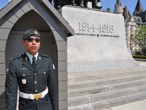 Joshua Kives, a soldier from Calgary, stands sentry at the National War Memorial in Ottawa in spring 2015.