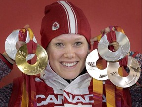 Six-time Olympic medallist Cindy Klassen has called it a career, announcing her retirement from speedskating Saturday at a news conference in Winnipeg. Klassen shows off her gold, two silver and two bronze medals at the Turin 2006 Winter Olympic Games Saturday, Feb. 25, 2006 in Turin.