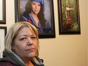 Shelly Jones with a photo of her daughter Lacey Jones-McKnight, who was killed by her ex boyfriend in Calgary.