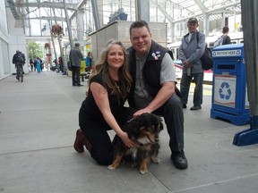 Giselle Thirlwall (left) with her dog Lizzy and CTrain driver Kelley Slimmon.