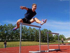 Local decathlete Austin Ost prepares for this weekend's CALTAF track and field classic by practising his hurdles on Thursday.