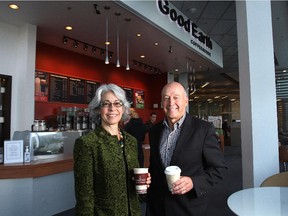 Nan Eskenazi, co-founder of Good Earth Coffeehouse, left and Michael Going, president and co-founder pose for a photo at their University of Calgary location in Calgary, Alberta on September 19, 2012.