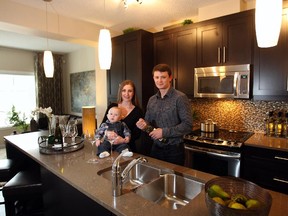 Elena and Victor Popa with son Victor Jr in an Ebony townhome in Mahogany.