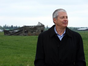 Guy Buchanan, president of Co-Star Consulting, looks out over the Gardner lands that Western Securities is proposing for development. The old Gardner homestead is visible in the background.