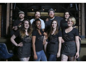 Some of the staff at Last Best Brewing that pull the show together daily are, Phil Brian, brewery operations manager, back row, from left, Adam Trotchie, chef de cuisine, Bryce Parsons, master distiller, Keil Wilson, brewer, and in the front row the front of house staff from left, Alexis Lerigny, Feven Tavesse, Jannell Scott and Serena Boulay-Rodriguez, and all stop their busy afternoons for a moment to pose for a photo in the restaurant in Calgary, on June 5, 2015.