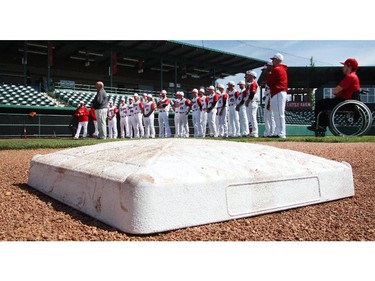 Okotoks Dawgs players on the Seaman Stadium field during the team's annual Media Day Thursday June 4, 2015. Friday is the team's home opener.