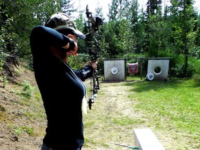 A participant works on her archery skills.