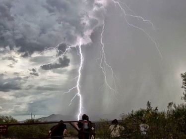 Storm chasers (including Beth Allan, centre), in action.