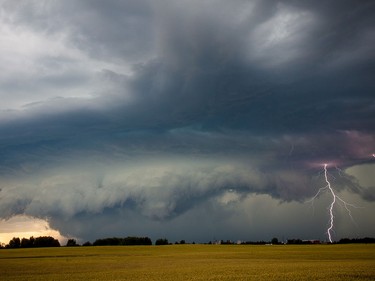 Storm chasers try to position themselves before a storm arrives in order to get the best view. This storm was over Fort Saskatchewan, Alta. in 2013.