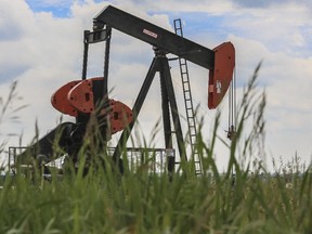 Crystal Schick/ Calgary Herald CALGARY, AB STK -- An oil pumpjack or pumping unit is photographed in a field northwest of Calgary, on June 19, 2015. --  (Crystal Schick/Calgary Herald) (For City story by  STK)