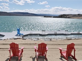 Relax at the beach on Ghost Lake at CottageClub.