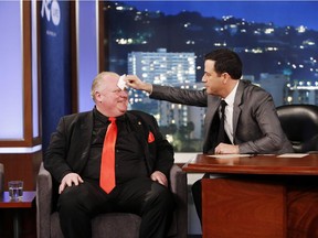 Talk show host Jimmy Kimmel wipes Rob Ford's forehead during the former Toronto mayor's appearance on his show. Reader says Ford was the subject of many comments about his weight.