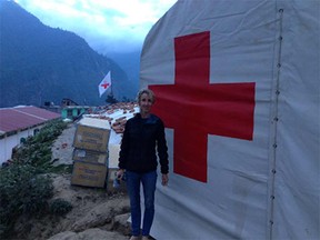 Sarah Mutch outside of the Dunche Red Cross field hospital.