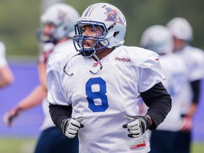 Nik Lewis, now of the Montreal Alouettes, is set to face his former team for the first time Friday night when the Calgary Stampeders visit. And he wants them to bring his Grey Cup ring. Calgary Herald / Files