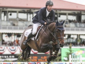 Jonathan Miller rides Calvin Klein in the $85,000 ATB Financial Cup at Spruce Meadows on Thursday.