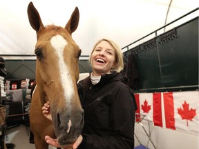 Canadian Tiffany Foster and her horse Southwind are ready for the Spruce Meadows National tournament, which begins on Wednesday at the facility south of Calgary.