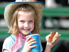During the annual family fun days sponsored by Spruce Meadows and the 
Calgary Herald, guests can enjoy complimentary hot dogs and soft drinks.