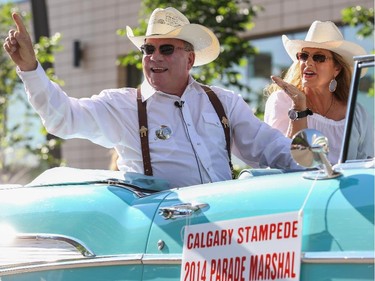 William Shatner, as the 2014 Stampede Parade Grand Marshal, with his wife Elizabeth, during the parade in Calgary, on July 4, 2014.