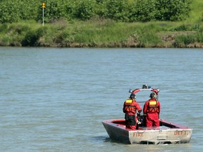 Calgary Fire Department water rescue search the Bow river west of Harvie Passage.