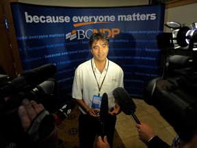 Moe Sihota talks with the media on November 29, 2009, after being elected president of the B.C. New Democratic party at the convention in Vancouver.