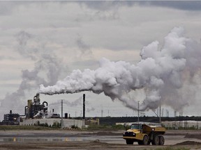 A dump truck works near the Syncrude oilsands extraction facility near Fort McMurray.