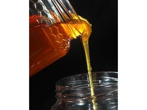Honey drips at Chinook Honey Company in Okotoks.