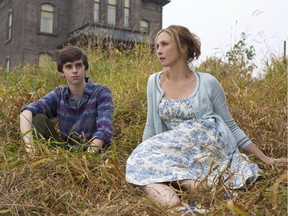 This undated publicity image released by A&E shows Freddie Highmore as Norman Bates, left, and Vera Farmiga as Norma Bates in a scene from A&E's "Bates Motel," premiering Monday, March 18, 2013 at 10 p.m. on A&E.