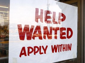 MOUNT PROSPECT, IL - DECEMBER 5:  A sign that reads "Help Wanted Apply Within" is seen hanging in a window of a beverage store December 5, 2003 in Mount Prospect, Illinois. The Bureau of Labor Statistics of the U.S. Department of Labor released the November Employment Report today stating employment continued to trend up in November and the unemployment rate, at 5.9 percent, was essentially unchanged from October. Non-farm payroll employment rose slightly over the month to 57,000.