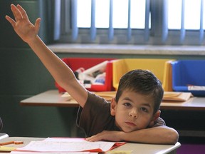 Windsor, ON. Sep. 17, 2008. Noah Atkins, a student at Our Lady of Perpetual Help school in Windsor participates in a classroom exercise Wednesday. The Catholic school boards released results of their EQAO tests for Grades 3, 6 and 9 at the school. (The Windsor Star-Dan Janisse)Windsor, ON. Sep. 17, 2008.Christopher Pella, a student at Our Lady of Perpetual Help school in Windsor participates in a classroom exercise Wednesday. The Catholic school boards released results of their EQAO tests for Grades 3, 6 and 9 at the school. (The Windsor Star-Dan Janisse) ORG XMIT: POS2014082116252960