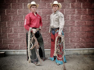 Rusty,19, left, and his dad Cody Wright are both competing in the saddle bronc competition at the Calgary Stampede.