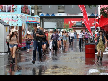 People were running for cover across the Stampede grounds when a hail storm hit.