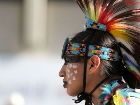 A member from Indian Village rides during the Calgary Stampede parade on July 3.