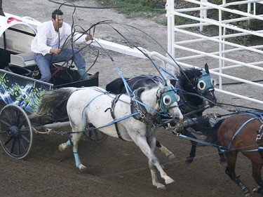 Kurt Bensmiller takes heat nine, day nine, of the GMC GMC Rangeland Derby at the Calgary Stampede Grandstand in Calgary on Saturday, July 11, 2015.