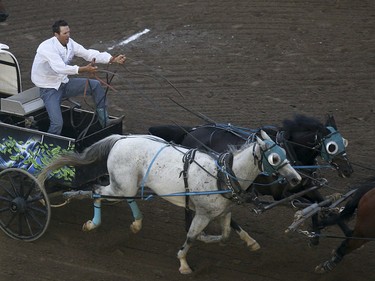 Kurt Bensmiller takes heat nine, day nine, of the GMC GMC Rangeland Derby at the Calgary Stampede Grandstand in Calgary on Saturday, July 11, 2015.