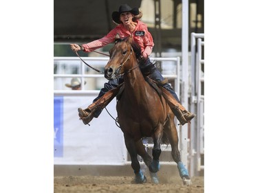 Pamela Capper races her way to a sixth place finish during Day 9 of barrel racing action at the 2015 Calgary Stampede, on July 11, 2015.