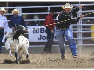 Clint Robinson is the quickest for Day 9 of tie-down roping action at the 2015 Calgary Stampede,, on July 11, 2015.