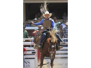 Chase Zweifel rides Truly Marvellous during Day 9 of novice saddle bronc  action at the 2015 Calgary Stampede, on July 11, 2015.