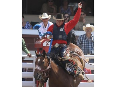 Kolby Wanchuk rides Say So Long during Day 9 of novice saddle bronc action at the 2015 Calgary Stampede,, on July 11, 2015.