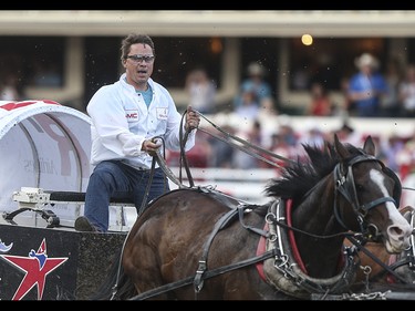 Mark Sutherland races during heat five, night ten, of the 2015 Calgary Stampede GMC Rangeland Derby's Chuckwagon Racing at the Stampede Grandstand in Calgary on Sunday, July 12, 2015.