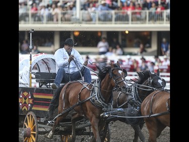 Troy Dorchester races during heat four, night ten, of the 2015 Calgary Stampede GMC Rangeland Derby's Chuckwagon Racing at the Stampede Grandstand in Calgary on Sunday, July 12, 2015.