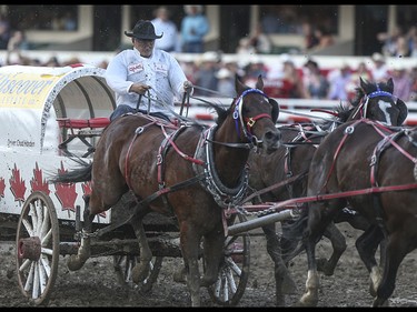 Chad Harden races during heat three, night ten, of the 2015 Calgary Stampede GMC Rangeland Derby's Chuckwagon Racing at the Stampede Grandstand in Calgary on Sunday, July 12, 2015.