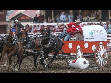 Colt Cosgrave takes out a barrel during heat eight, night ten, of the 2015 Calgary Stampede GMC Rangeland Derby's Chuckwagon Racing at the Stampede Grandstand in Calgary on Sunday, July 12, 2015.