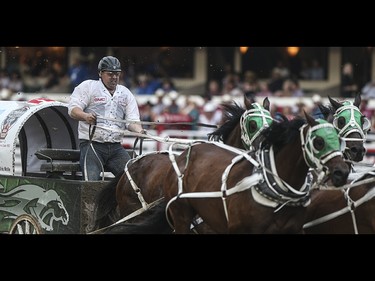 Kris Molle races during heat seven, night ten, of the 2015 Calgary Stampede GMC Rangeland Derby's Chuckwagon Racing at the Stampede Grandstand in Calgary on Sunday, July 12, 2015.