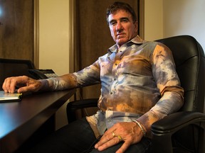 Jon Edmunds, lead plaintiff in the TIE Mortgage scheme, is angry with the sentence issued, at his boardroom at Dataco in Calgary on Tuesday, July 21, 2015.