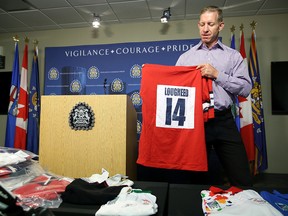 Dave Lougheed with his recovered stolen jerseys at Calgary Police Service Westwinds in Calgary on July 21, 2015.