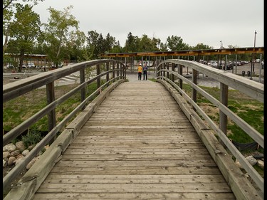 A refurbished bridge originally used on the island is repurposed as part of the design philosophy to re-use existing elements on St. Patrick's Island in Calgary on Wednesday, July 29, 2015.