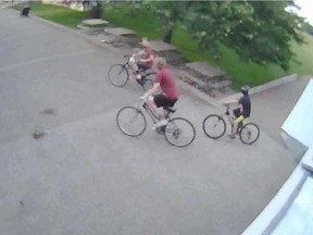 A screenshot image from surveillance video released by Lethbridge Police of suspects leaving the scene of a playground assault on July 7, 2015.