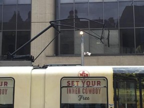 A fractured pantograph, a piece of equipment that connects the train to the overhead power lines, snagged wires at the City Hall LRT station, sparking a power outage and causing delays for downtown commuters.