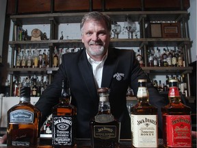 Jeff Arnett, master distiller with Jack Daniels, with a selection of his brands Tuesday July 8, 2015.