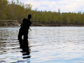 A fisherman on the Bow River in Calgary.